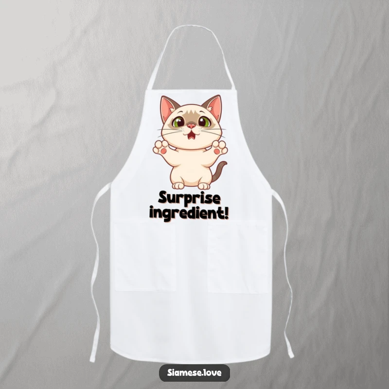 Funny apron showing a Siamese cat with paws up in a surprised pose, designed to add humor and flair to kitchen activities.