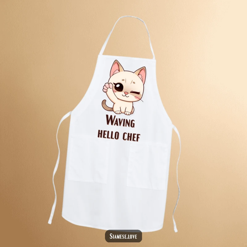 Funny apron showing a Siamese cat winking and waving with its paw, designed to add a friendly and humorous touch to kitchen activities.