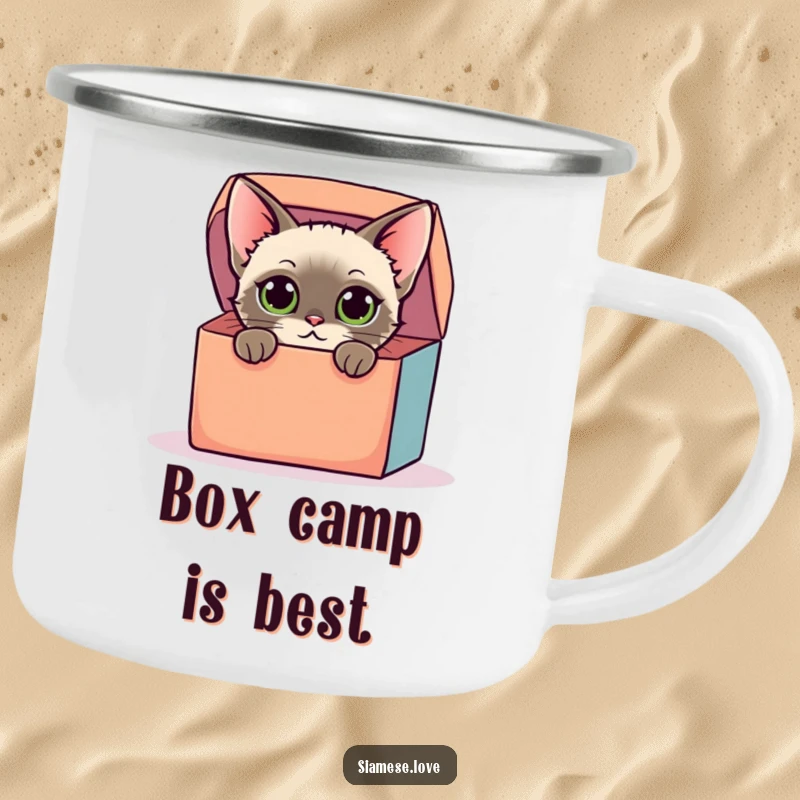 Funny camping mug with a stylized Siamese cat with curious eyes peeking from a colorful oversized box, perfect for outdoor humor.
