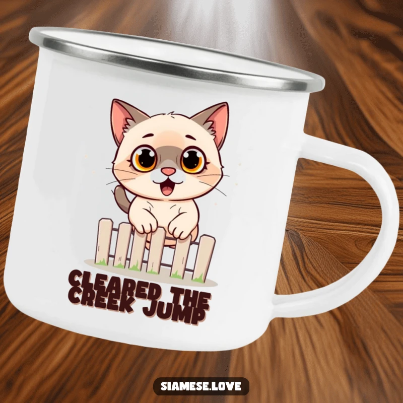 Funny Siamese cat camping mug showing a startled cat mid-jump over a fence, designed for outdoor use and lighthearted moments.