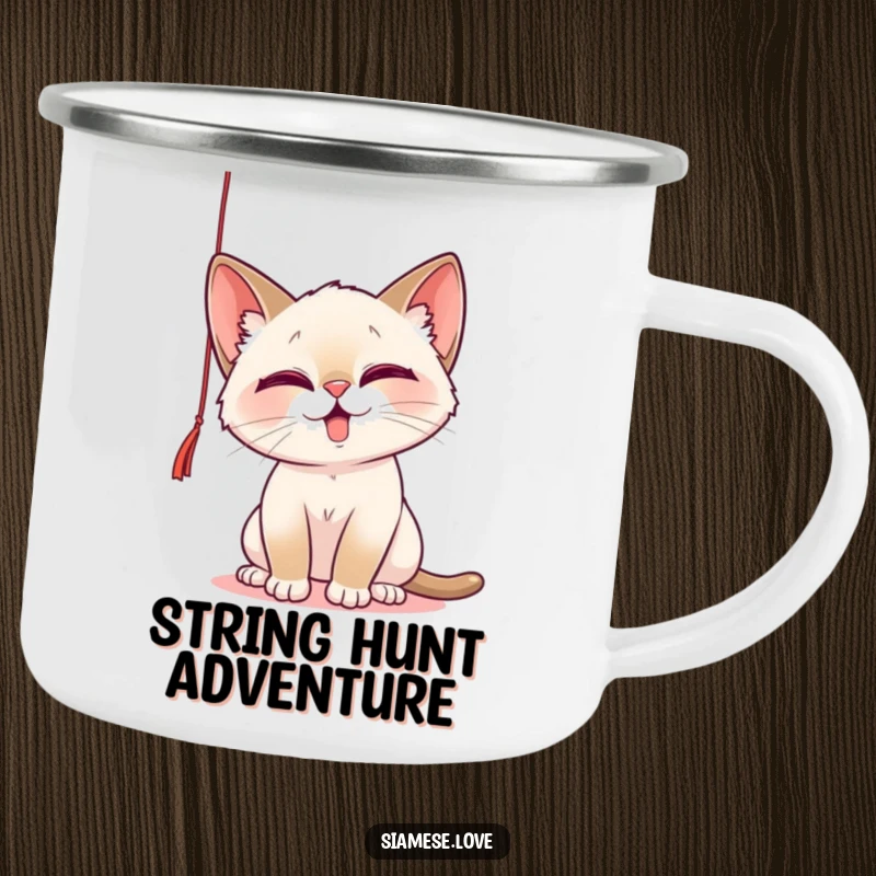Funny Camping Mug featuring a playful Siamese cat batting at a dangling string, perfect for enjoying drinks during outdoor fun.