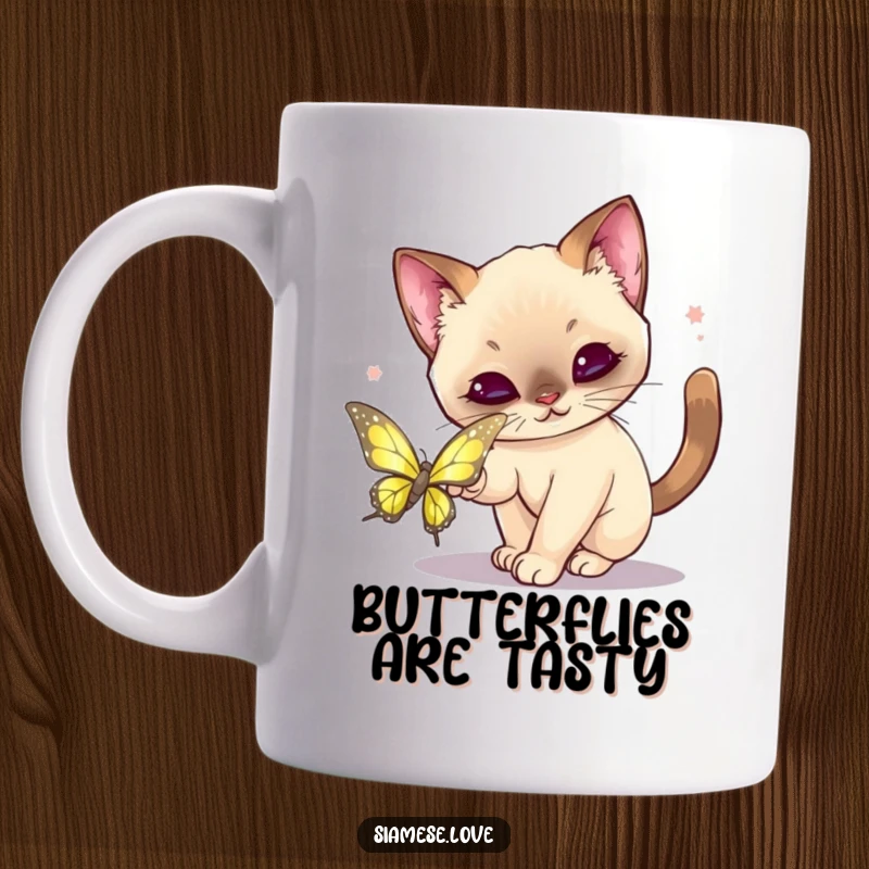 Funny Kawaii Siamese Cat Mug: Cute cat mid-pounce, aiming for a shimmering butterfly, full of playful intent.