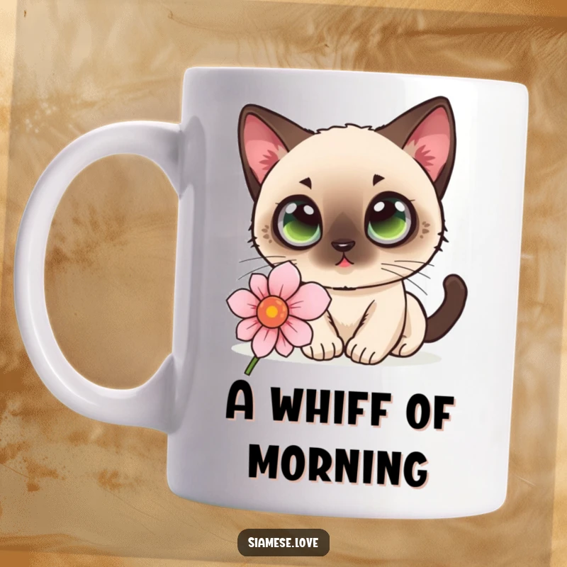 Funny kawaii Siamese cat with wide eyes curiously sniffing a delicate flower on a mug, full of wonder.