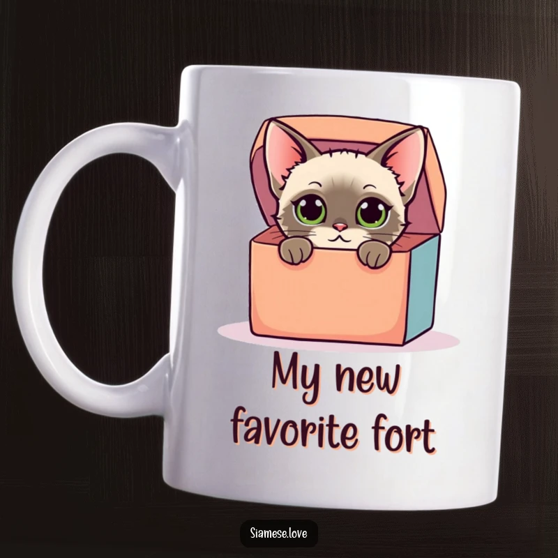 Funny mug showing a stylized Siamese cat with curious eyes peeking out of an oversized colorful box, perfect for a humorous gift.