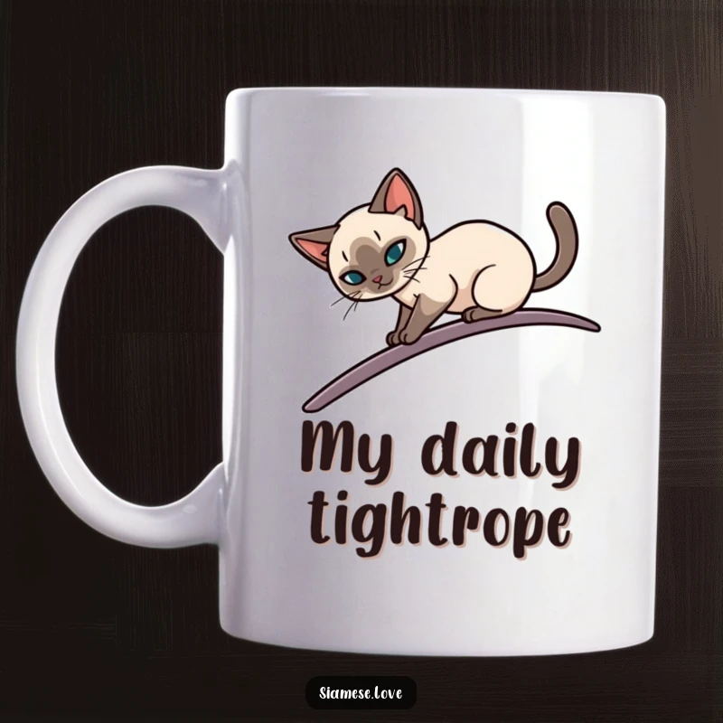 Funny mug depicting a sleek Siamese cat elegantly balancing on a narrow, curving surface, showcasing grace and humor for a perfect gift.