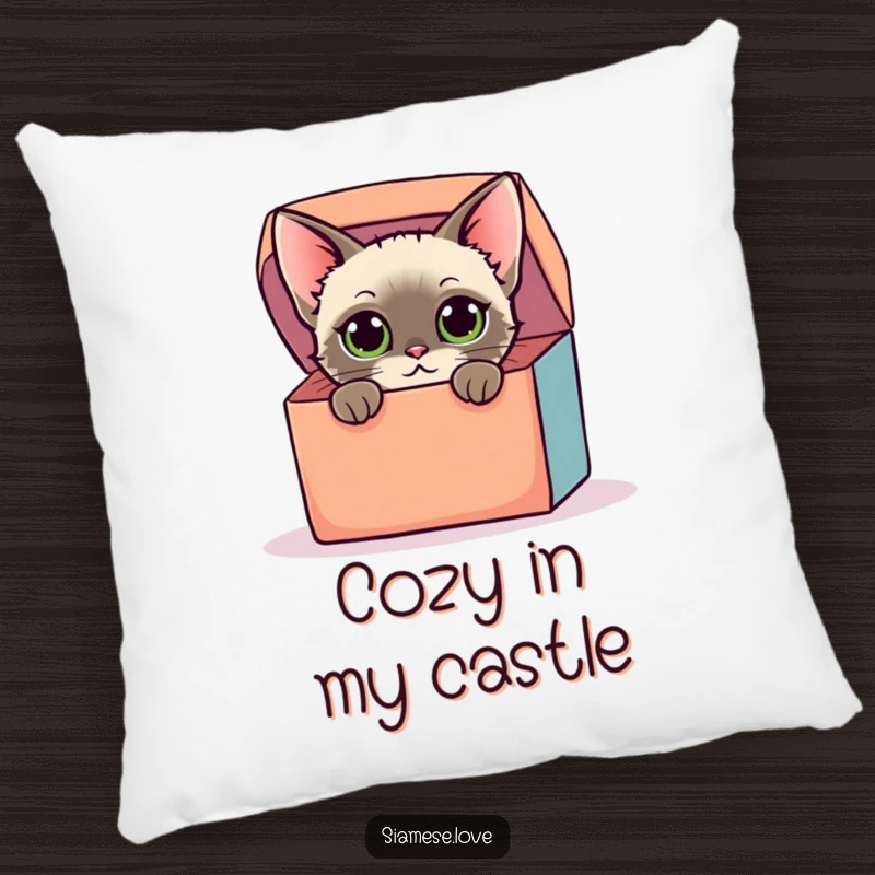 Funny pillow featuring a stylized Siamese cat with curious eyes peeking from a colorful oversized box, offering comfort and playful humor.