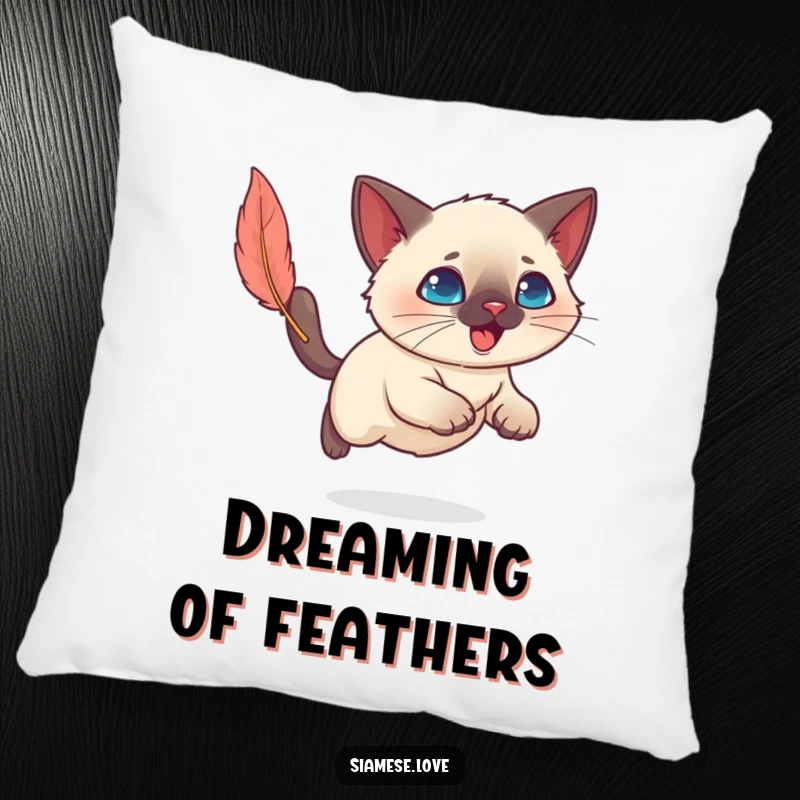 Funny Kawaii Siamese cat playfully pouncing on a feather toy, making this pillow a delightful and humorous accent.