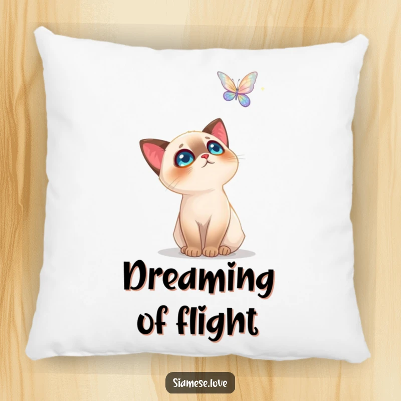 Funny Siamese Cat Pillow: A soft, decorative pillow showing a cat mesmerized by a sparkling butterfly, perfect for cozy spaces.