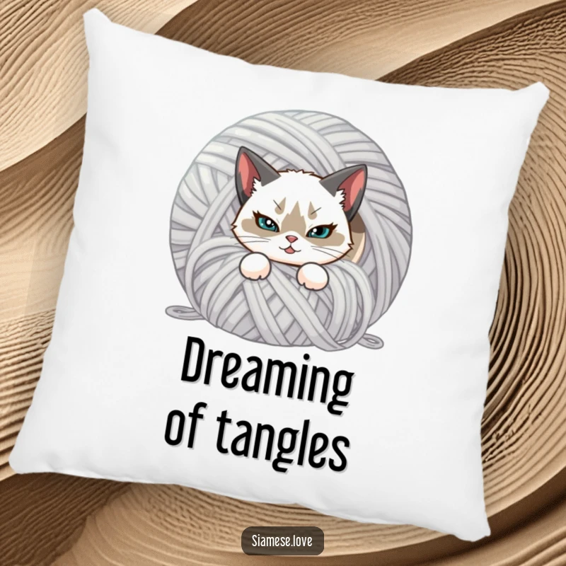 Funny decorative pillow featuring a mischievous Siamese cat hiding behind a ball of yarn. Soft and humorous.