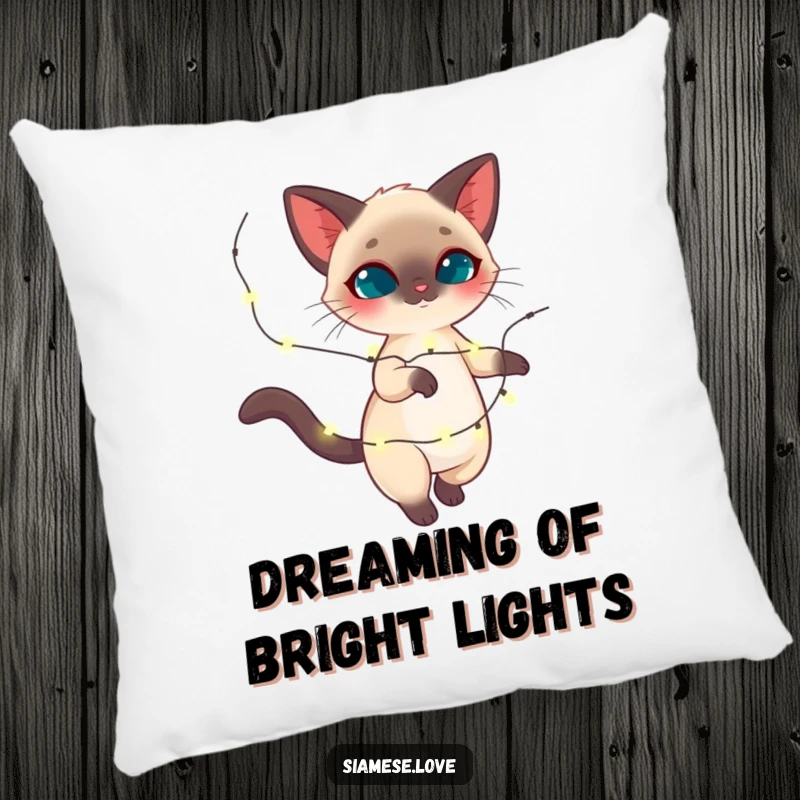 Funny Siamese cat pillow, feline twirling with sparkling holiday lights, cozy festive decor, ideal funny gift.