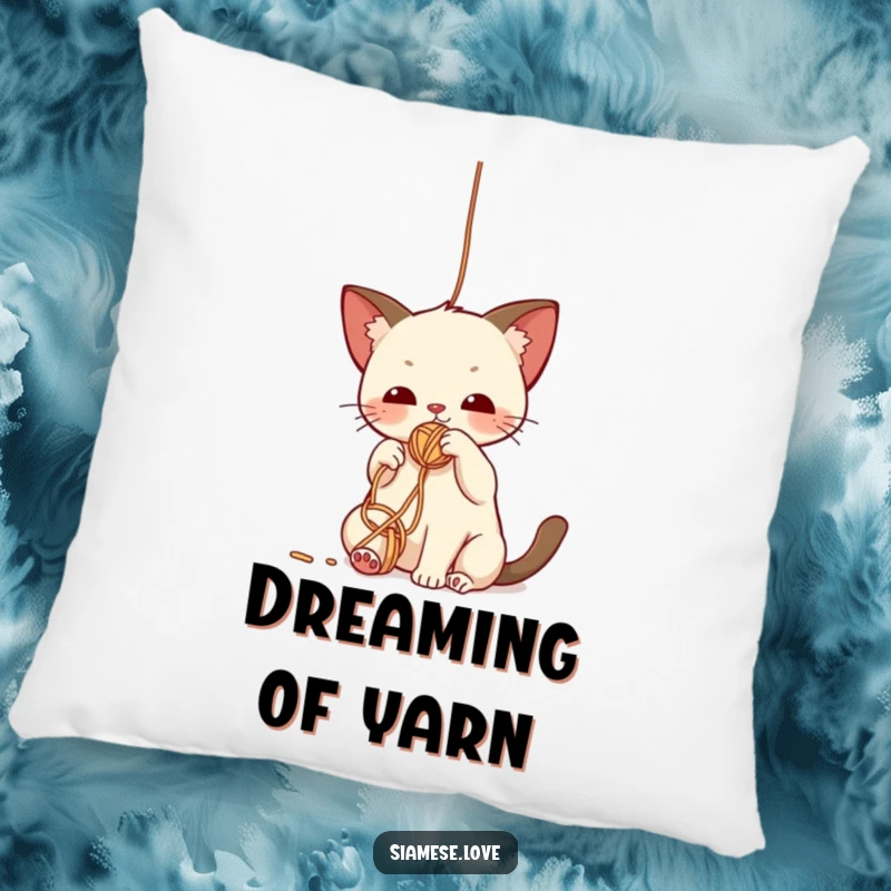 Funny pillow showcasing a cute kawaii Siamese cat batting playfully at a dangling yarn ball, designed for comfort and smiles.