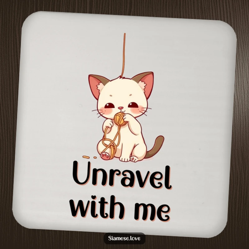 Funny drink coaster featuring a cute kawaii Siamese cat batting playfully at a dangling yarn ball, adding a fun touch.