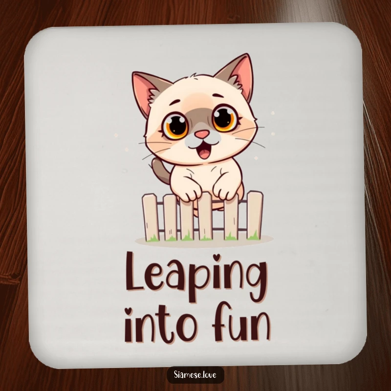 Funny Siamese cat drink coaster depicting a surprised feline jumping over a fence, a humorous accessory for tables.