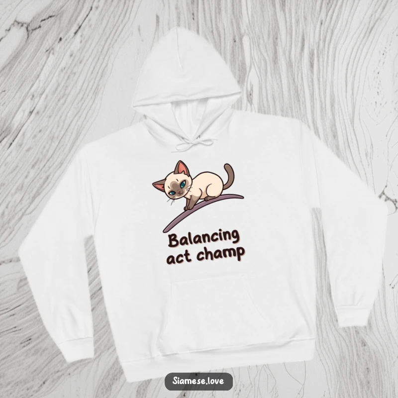 Funny hoodie featuring a sleek Siamese cat elegantly balancing on a narrow, curving surface, offering warmth and graceful humor for a great gift.