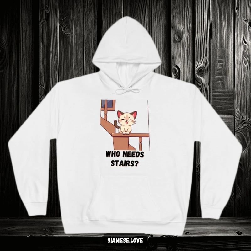 Funny hoodie featuring a stylized Siamese cat playfully sliding down a banister with a joyful expression, offering warmth and playful humor.