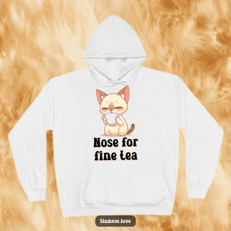 Funny Siamese cat balancing a teacup on its nose on a cozy hoodie, radiating calm concentration and playful spirit.