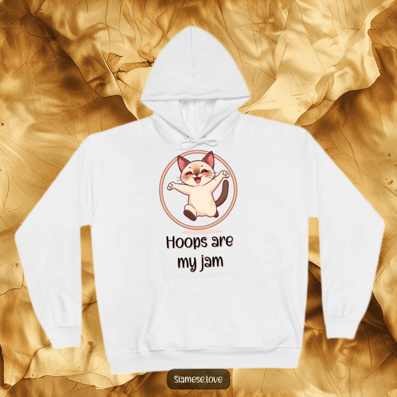 Funny hoodie showing a cheerful Siamese cat joyfully leaping through a hoop, exuding happiness and energy.