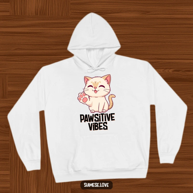 Funny Kawaii Siamese cat offering a friendly paw with a sweet smile on a plush hoodie, perfect for cozying up.