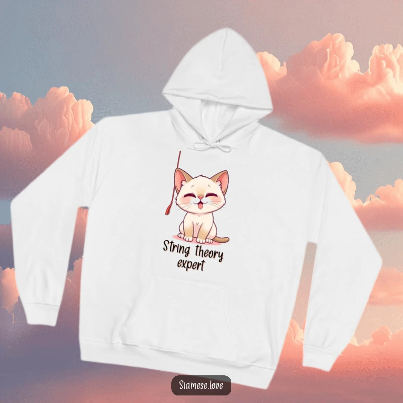 Funny Hoodie featuring a playful Siamese cat with a mischievous glint, batting at a dangling string, offering cozy and humorous vibes.