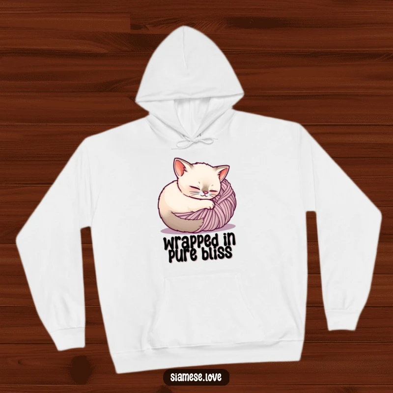Funny Siamese cat hoodie, a peaceful cat is curled up inside a ball of yarn, embodying ultimate comfort.
