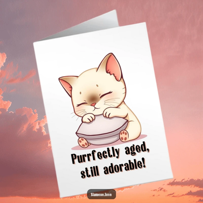 Funny Free Printable Birthday Card featuring a kawaii Siamese cat nuzzling a cushion, radiating pure contentment and birthday joy.