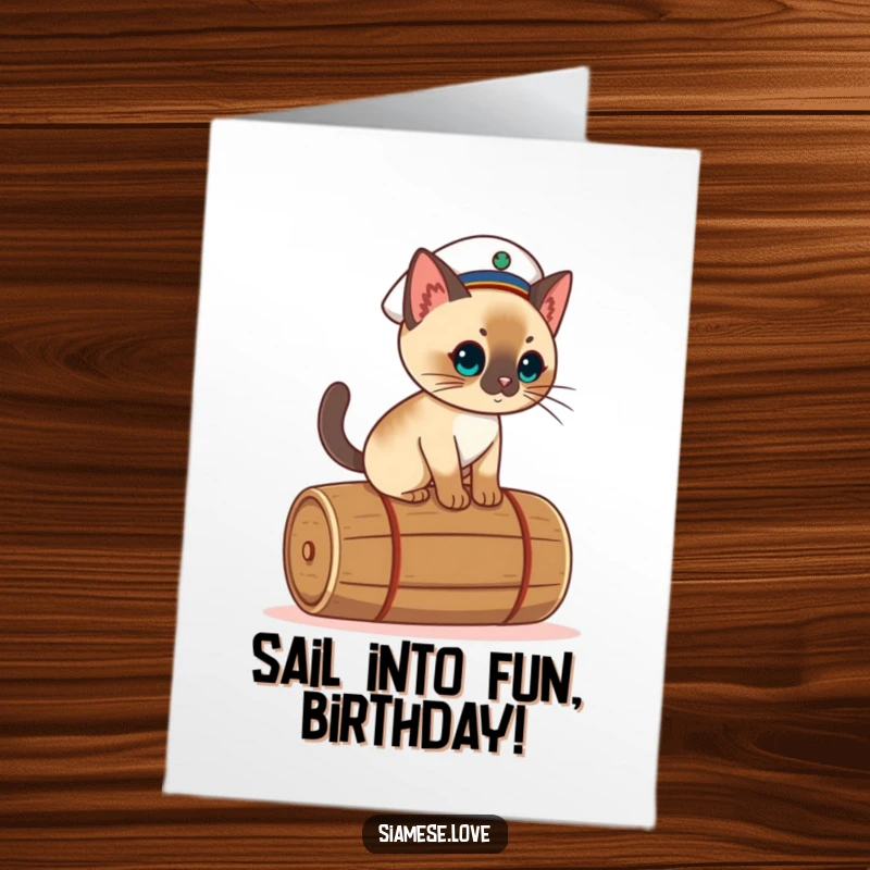 Funny Free Printable Birthday Card: Kawaii Siamese cat in a sailor hat, precariously balancing on a rolling barrel.