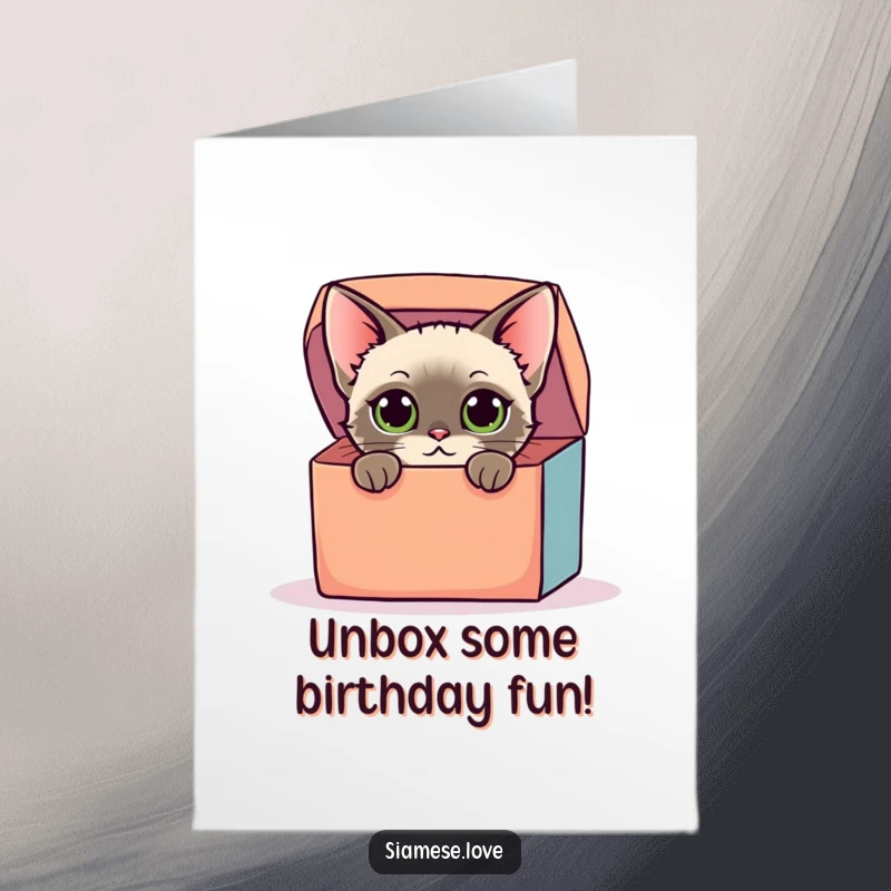 Funny Free Printable Birthday Card: Siamese cat with curious large eyes peeking out from an oversized, brightly colored gift box.