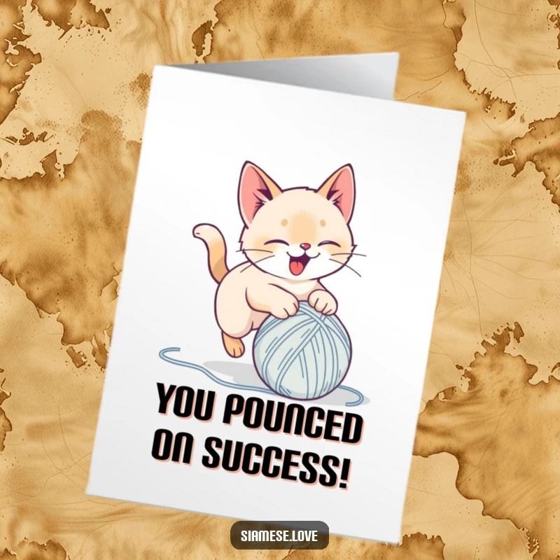 Funny Free Printable Congratulations Card: Stylized Siamese cat pouncing on a yarn ball, looking utterly delighted for your success.
