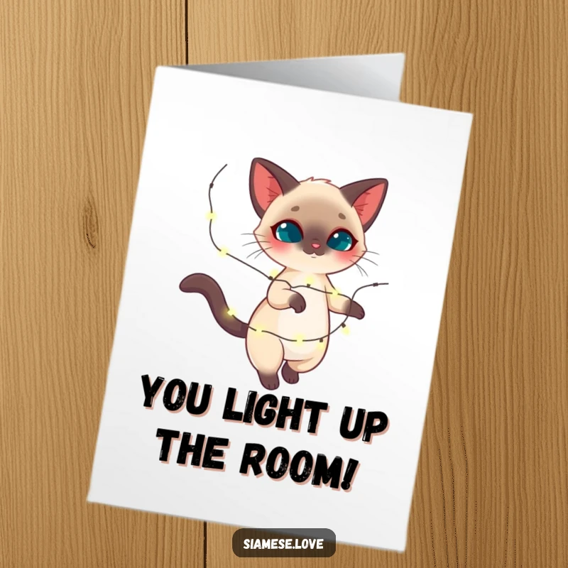 Funny Free Printable Congratulations Card: Elegant Siamese cat twirling, surrounded by a delightful array of sparkling lights, conveying joy.