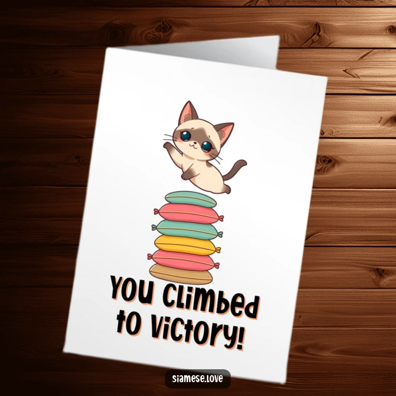 Funny Free Printable Congrats Card: A Siamese cat gracefully leaping onto a stack of cushions, symbolizing achievement.