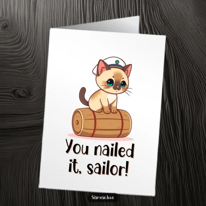 Funny Free Printable Congratulations Card: Adorable Siamese cat in sailor attire, balancing on a rolling barrel, signifying navigating challenges.