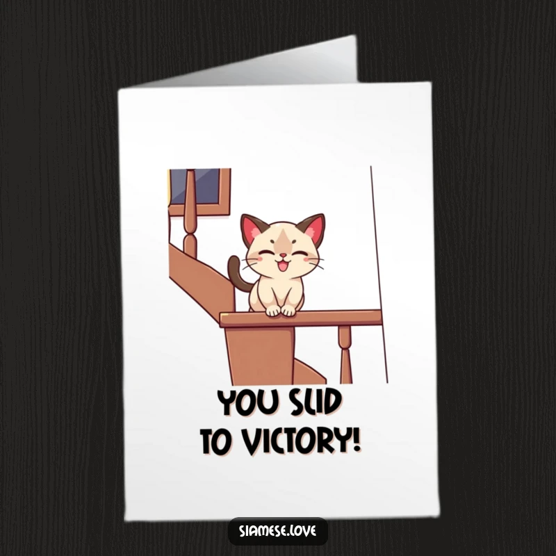 Funny Free Printable Congratulations Card: Siamese cat sliding down a banister with a playful expression, celebrating your success.