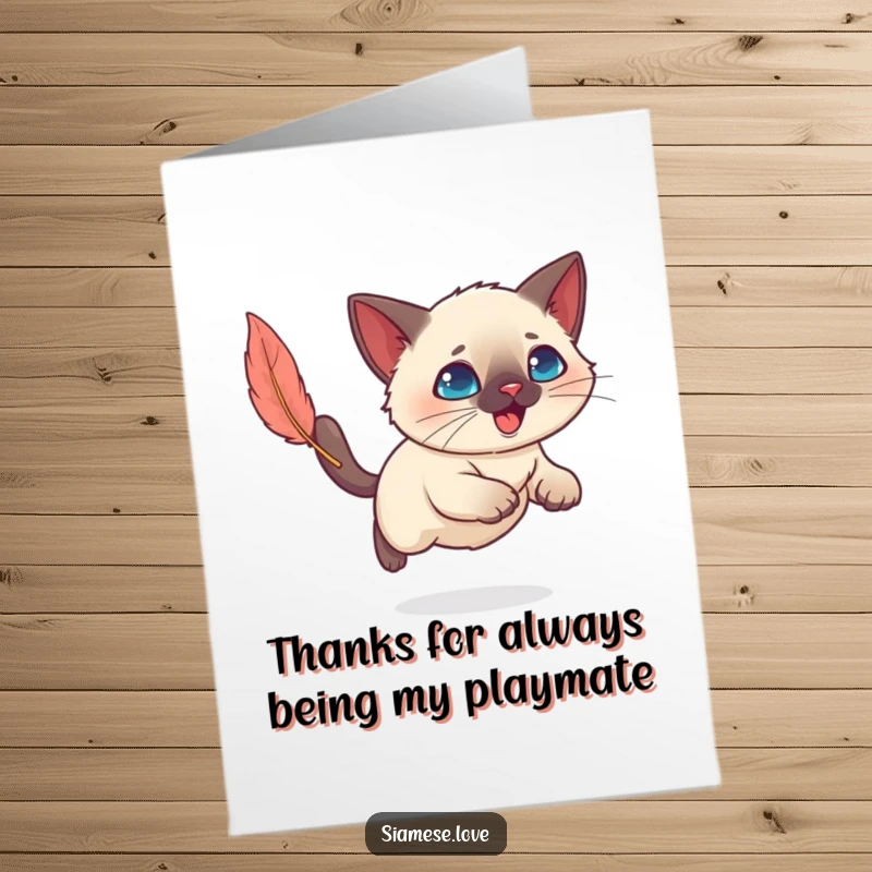 Funny Free Printable Thank You Card: Kawaii Siamese cat batting playfully at a feather, expressing thanks with feline charm.