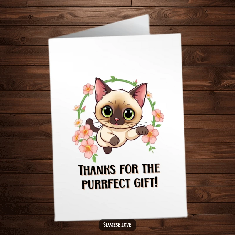 Funny Free Printable Thank You Card: Siamese cat with curious eyes leaps through a flower hoop, expressing thanks gracefully.