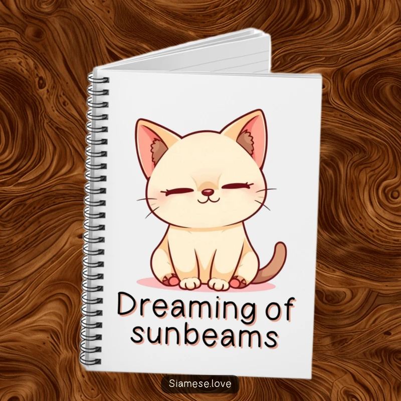 Funny Kawaii Siamese cat sleeping peacefully in a sunbeam on a notebook, ideal for calm note-taking.