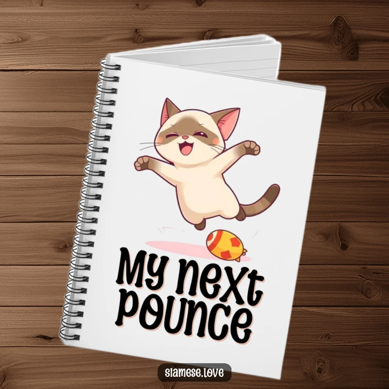 Funny kawaii Siamese cat notebook, mid-leap with a toy, ideal for jotting down creative thoughts with playful energy.