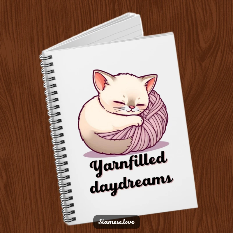 Funny Siamese cat notebook cover, a cat curled up contentedly inside a ball of yarn, suitable for journaling.