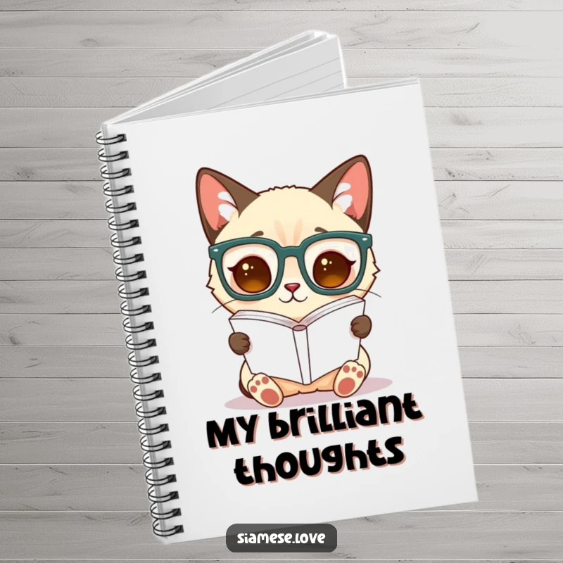Funny Siamese cat notebook cover, a cat with large glasses reads an inverted book, ideal for journaling.
