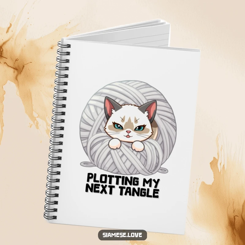 Funny notebook featuring a Siamese cat with a mischievous smirk, hiding behind yarn. Ideal for notes and journaling.