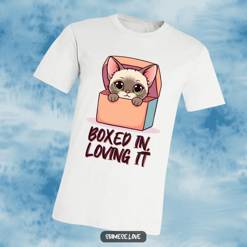 Funny t-shirt with a stylized Siamese cat displaying curious eyes while peeking from a colorful oversized box, great for a humorous gift.
