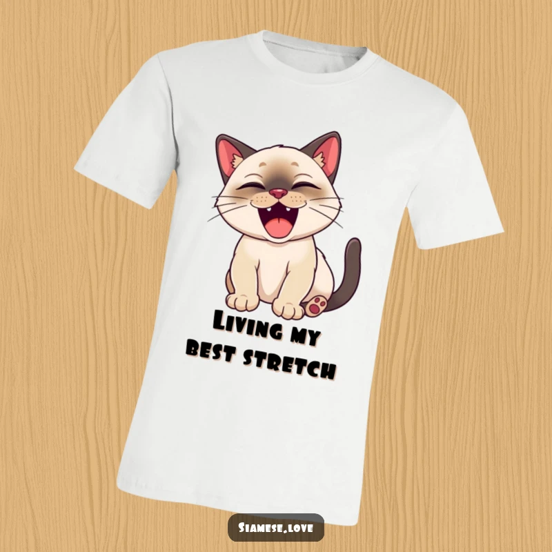 Funny Siamese cat character happily stretching with a big, satisfied yawn on a t-shirt.