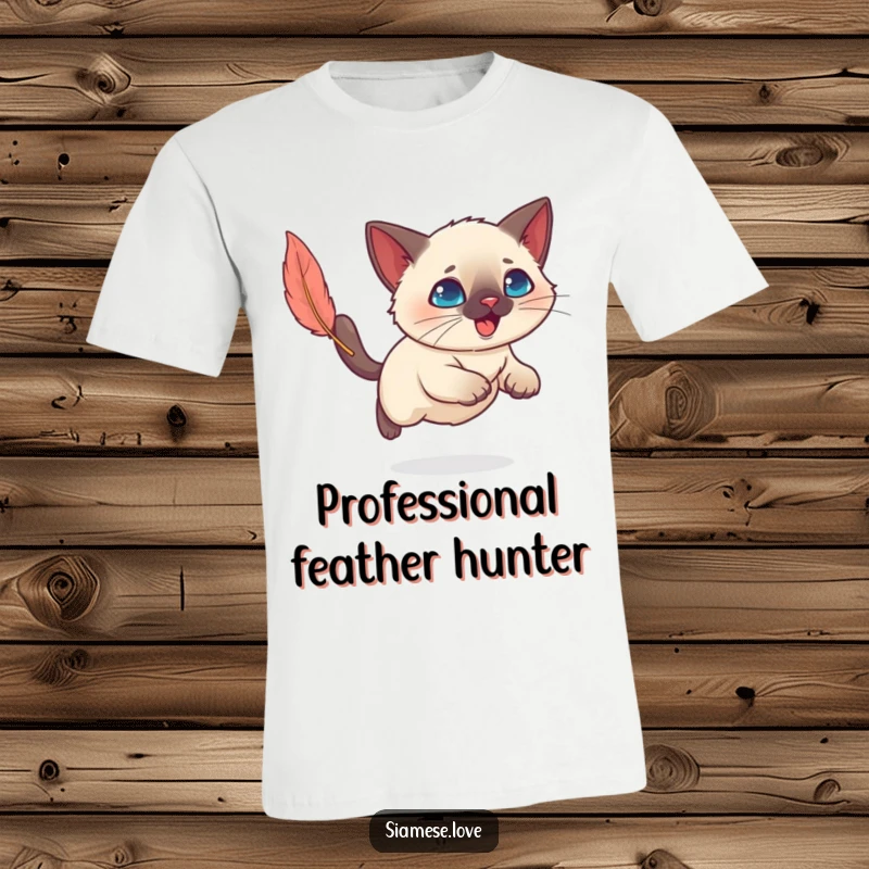 Funny Kawaii Siamese cat energetically chasing a feather toy, showcasing its playful and humorous side on a t-shirt.