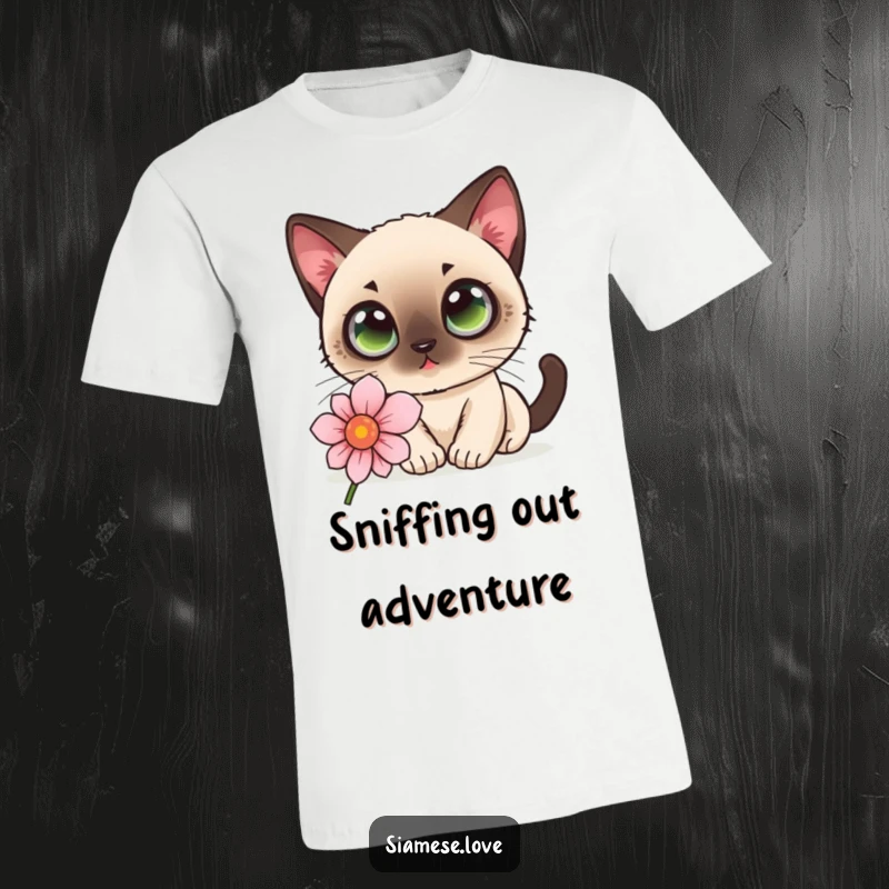 Funny kawaii Siamese cat with big eyes sniffing a flower on a t-shirt, embodying gentle curiosity.