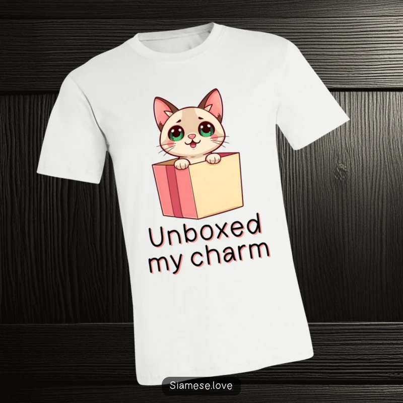 Funny Siamese cat peeking out of a gift box with a surprised expression on a t-shirt, capturing the joy of discovery.