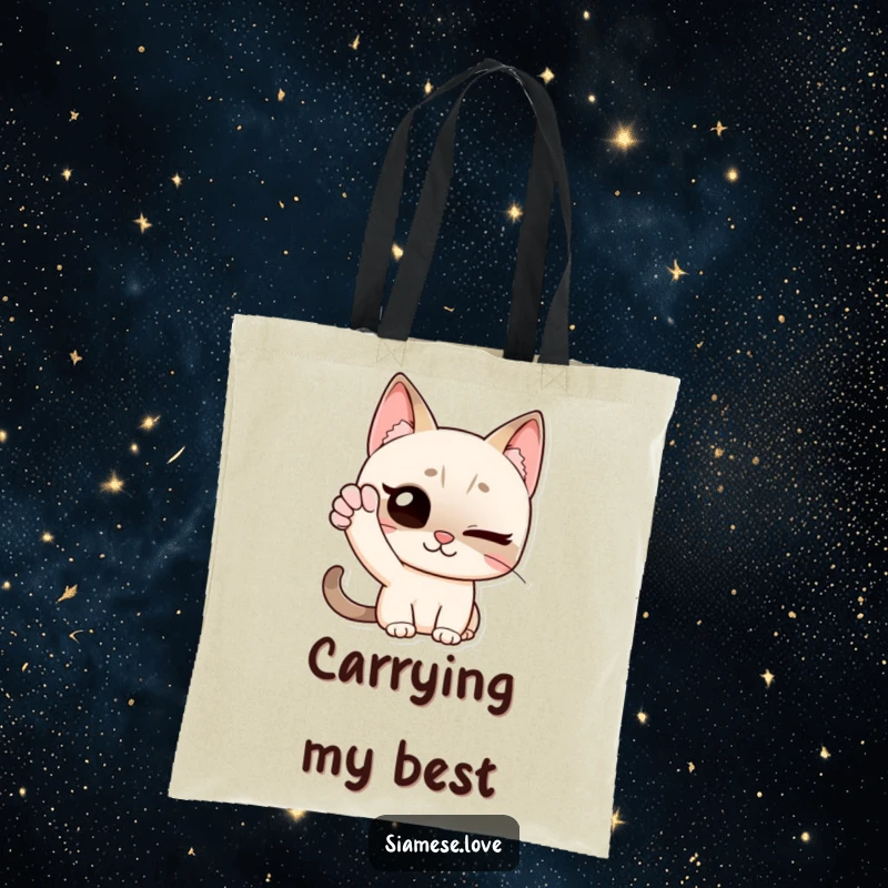 Funny tote bag featuring a Siamese cat winking and waving with its paw, designed for carrying items with a friendly and humorous flair.