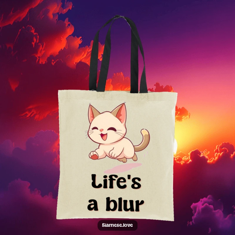 Funny tote bag featuring a Siamese cat in a motion blur, enthusiastically chasing its tail, designed for carrying essentials with a smile.