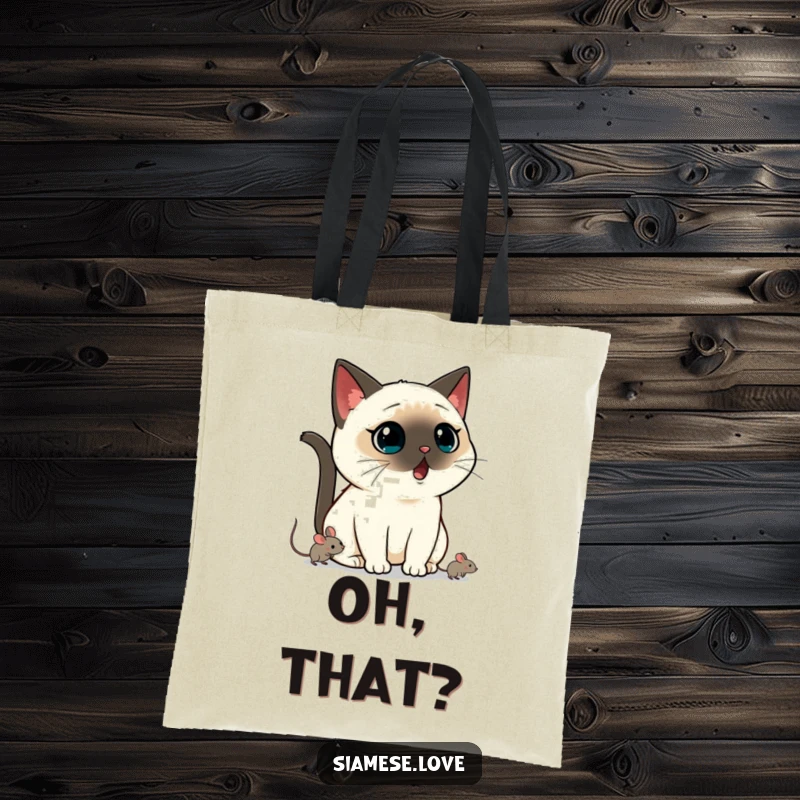 Funny Kawaii Siamese cat tote bag with a shocked expression, a mouse is seen scurrying away, perfect for a funny gift.